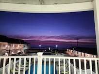 2nd floor common balcony at sunrise.