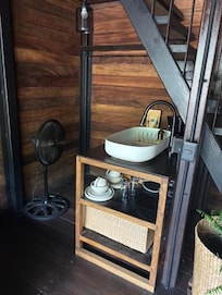 Kitchenette with a small refrigerator and stove