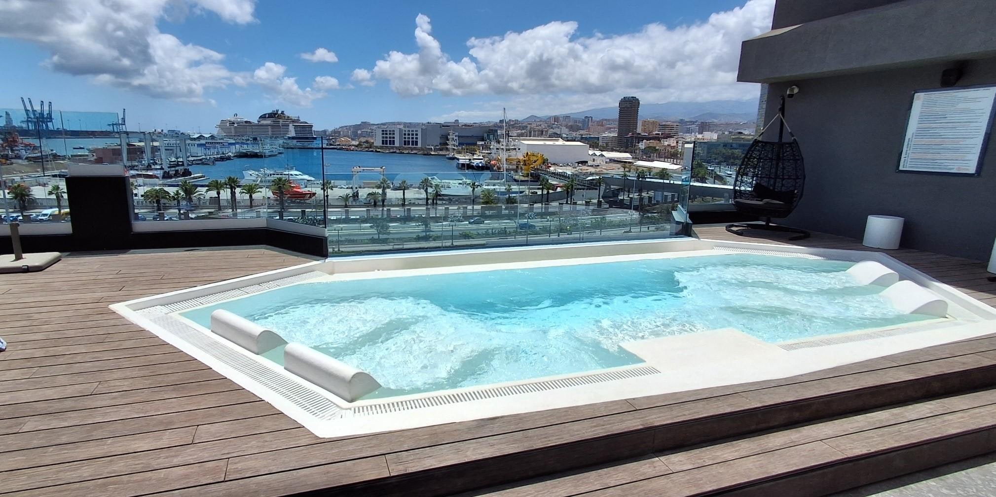 Rooftop pool and seating area