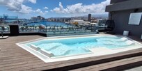 Rooftop pool and seating area