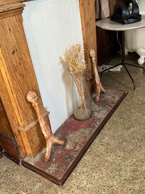 Fireplace in bedroom that is unusable & filthy dirty.