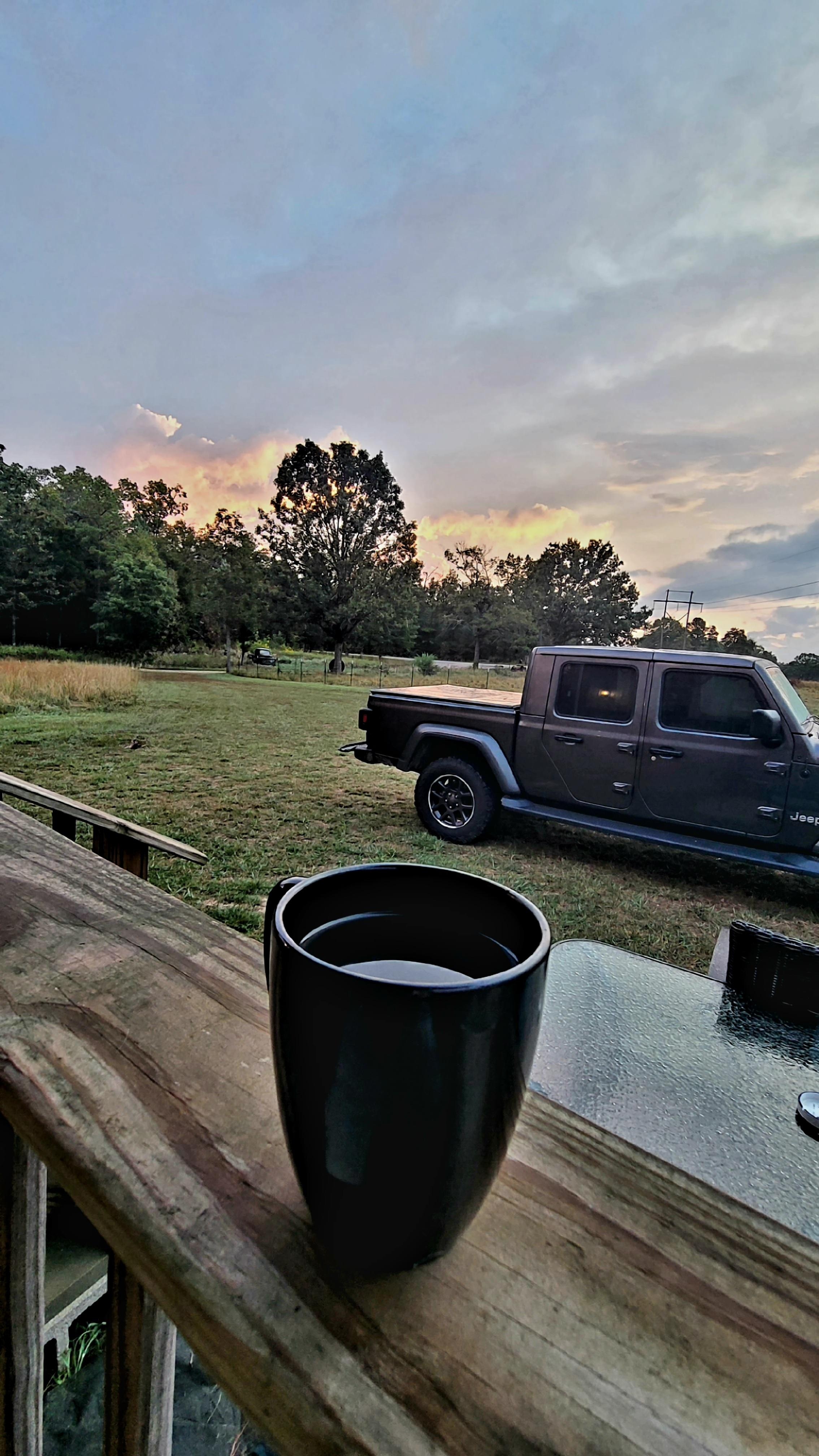 Enjoying coffee (provided) and watching the sunrise from the front porch! 