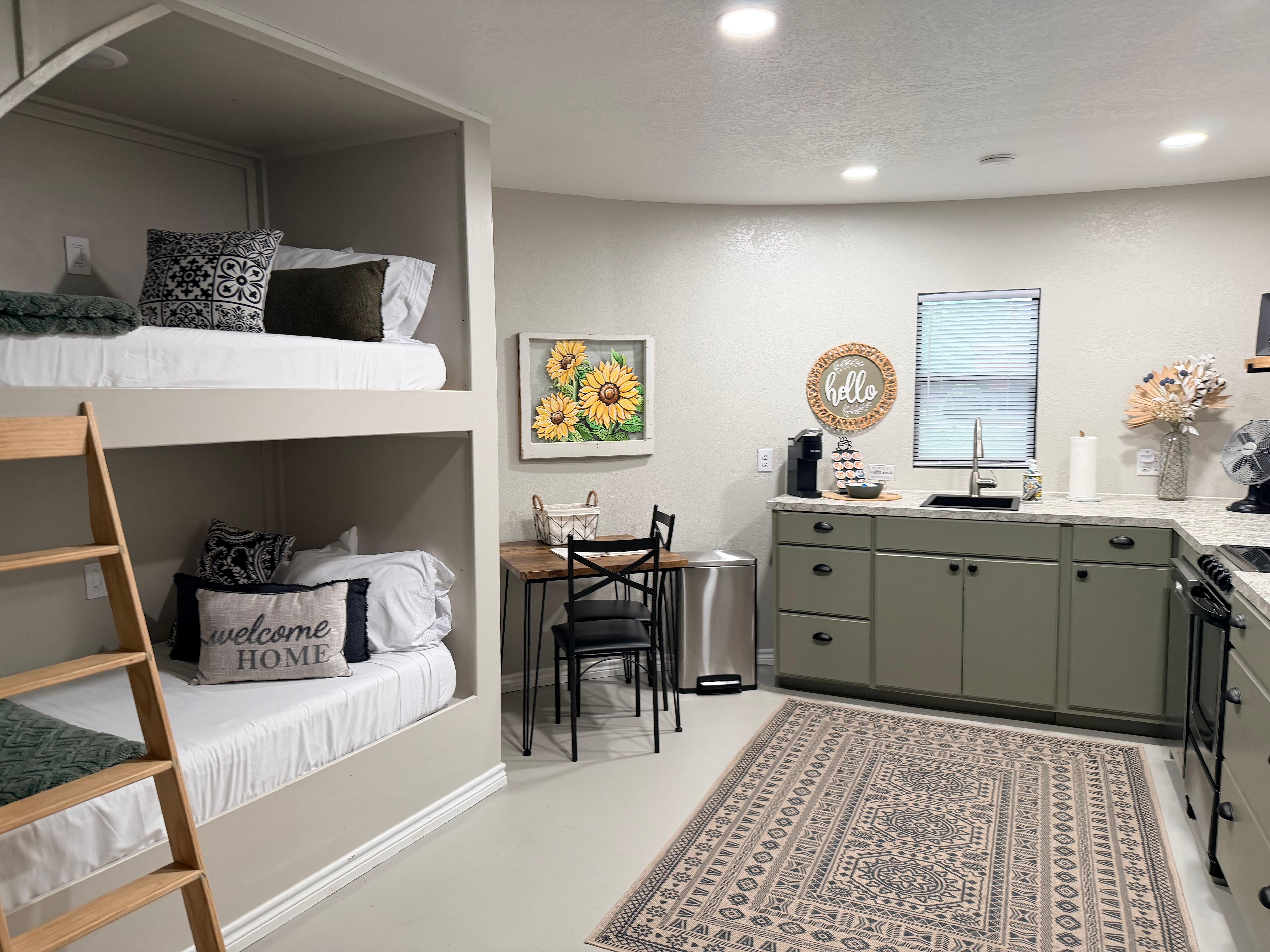 Complete kitchen and some cozy bunk beds 