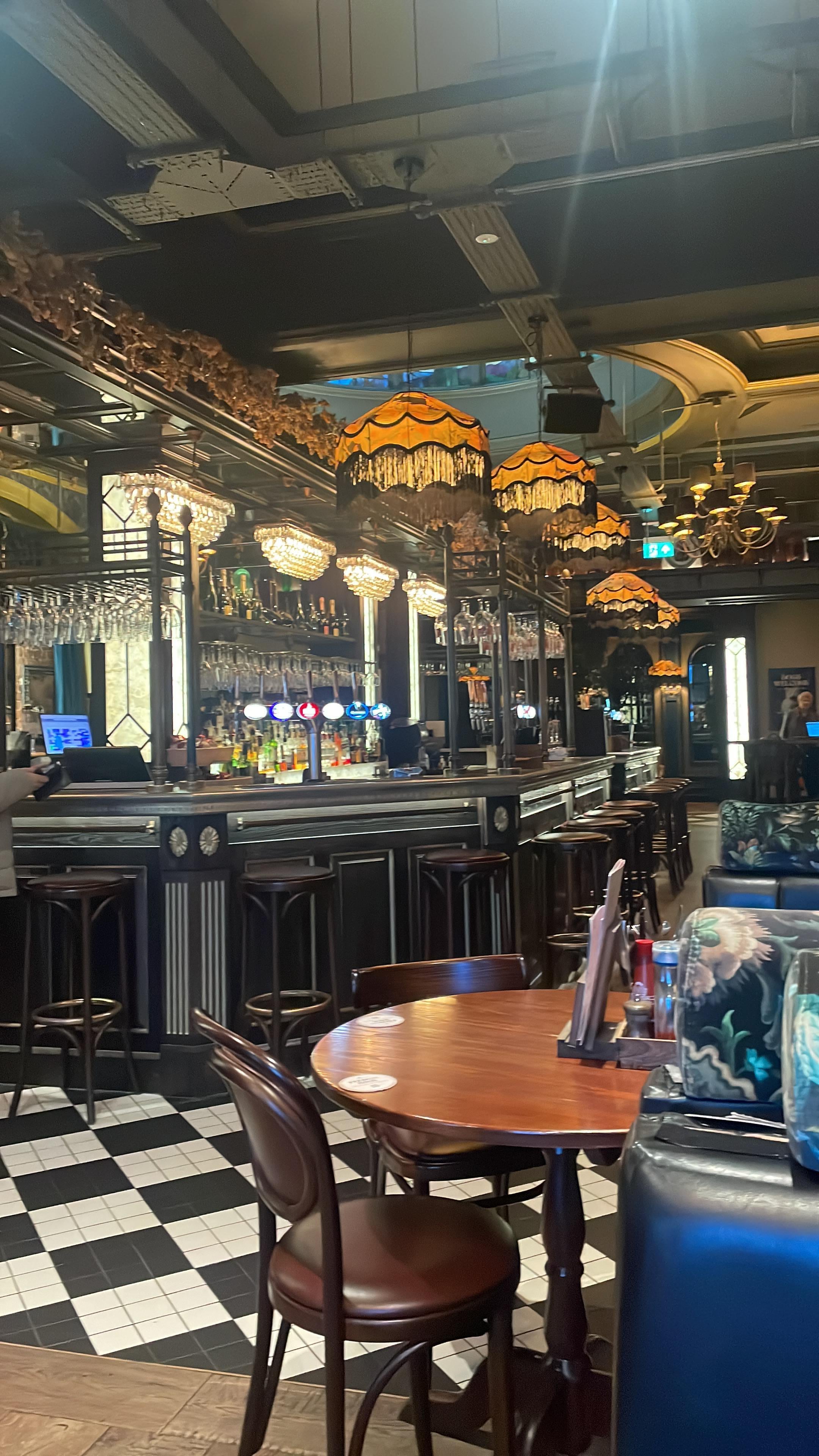 Barking George bar. There’s a phone in the hallway to ring for taxis.  