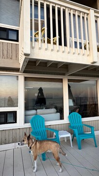 Upstairs balcony off the primary bedroom and deck below