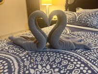Lovely towel art in the master bedroom