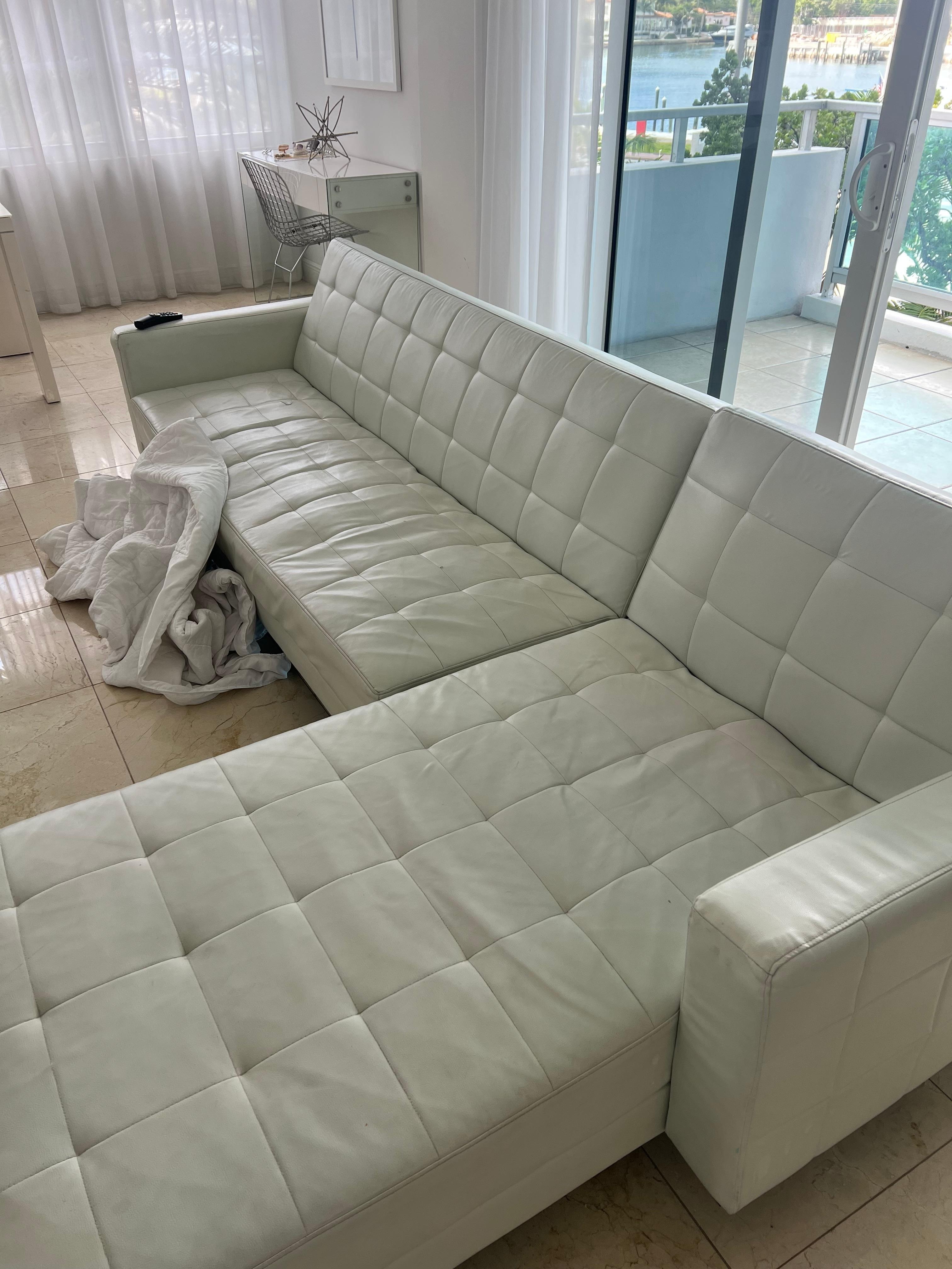 This is the couch that was there.  No pillows, throws, blankets, and you couldn't control the AC so it was quite cold.  