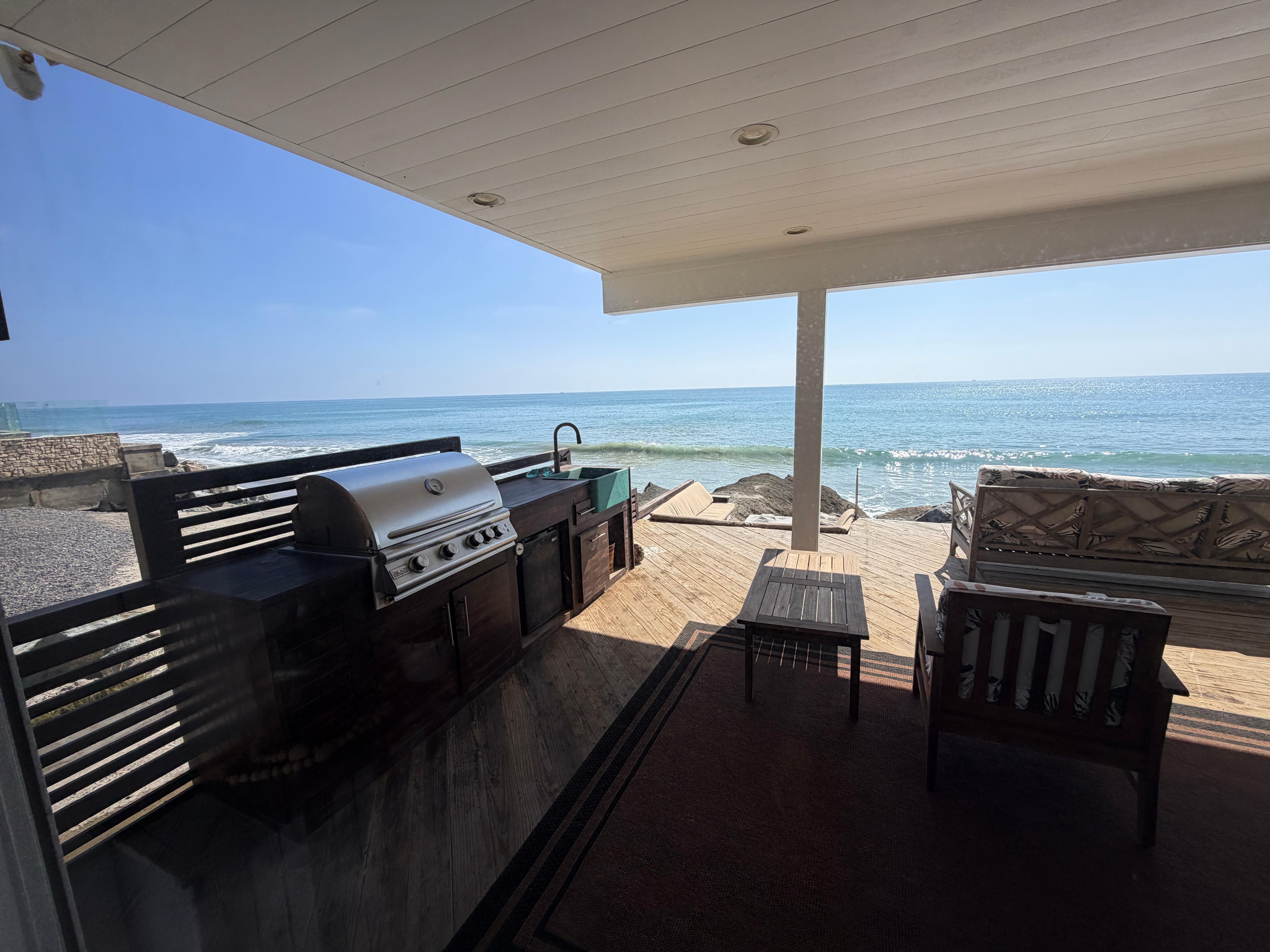Spacious lanai with a grill and great seating areas to relax.