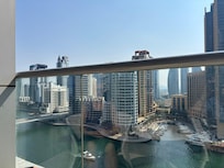 Room with balcony and marina view