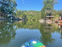 In the water on my SUP just off the dock.