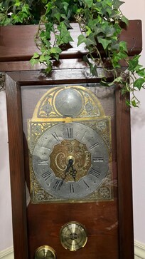 Grandfather clock in the entryway.
