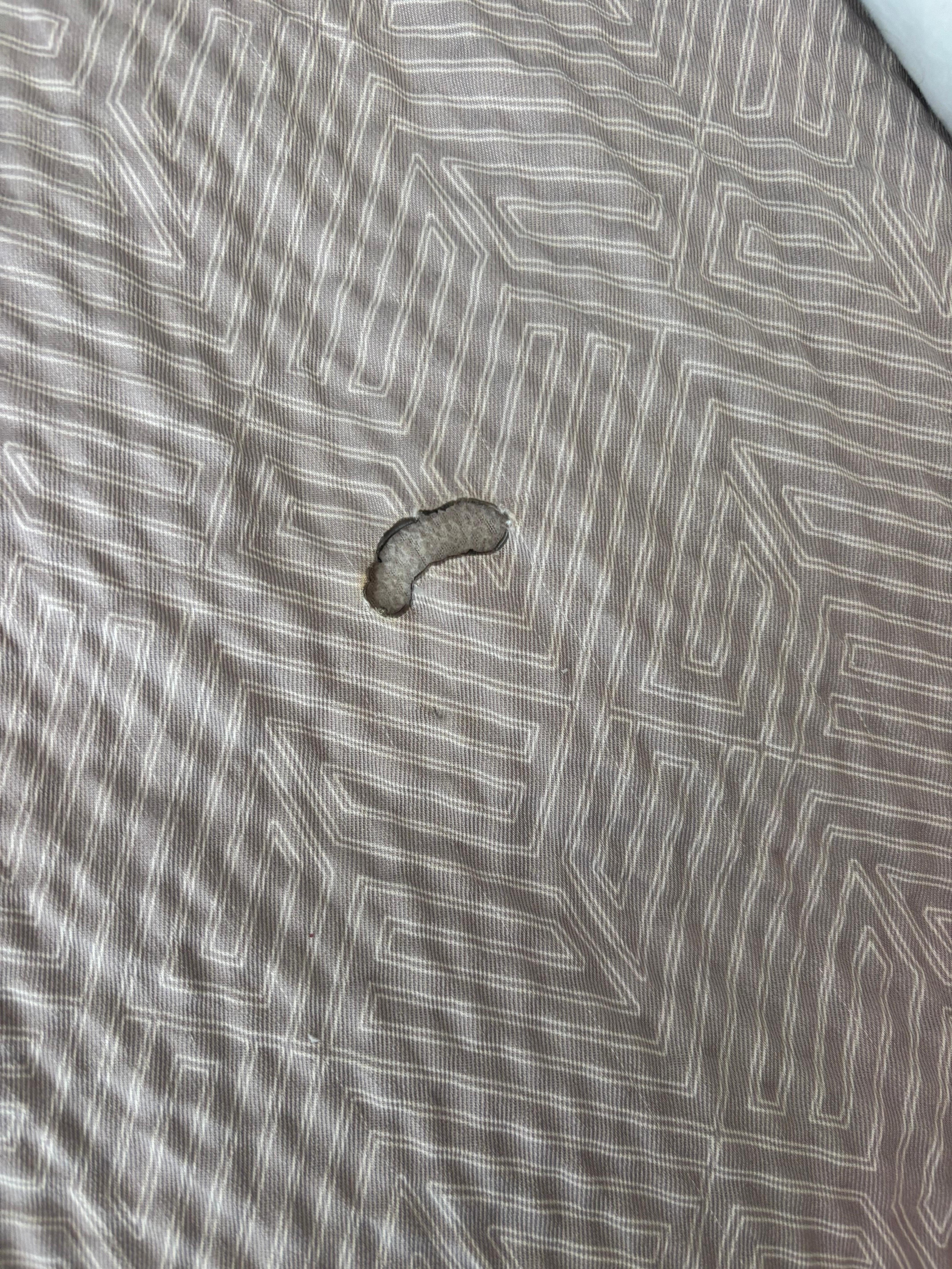 I only took one photo because I couldn’t get out of the room fast enough this was the comforter,it had a big burn hole!