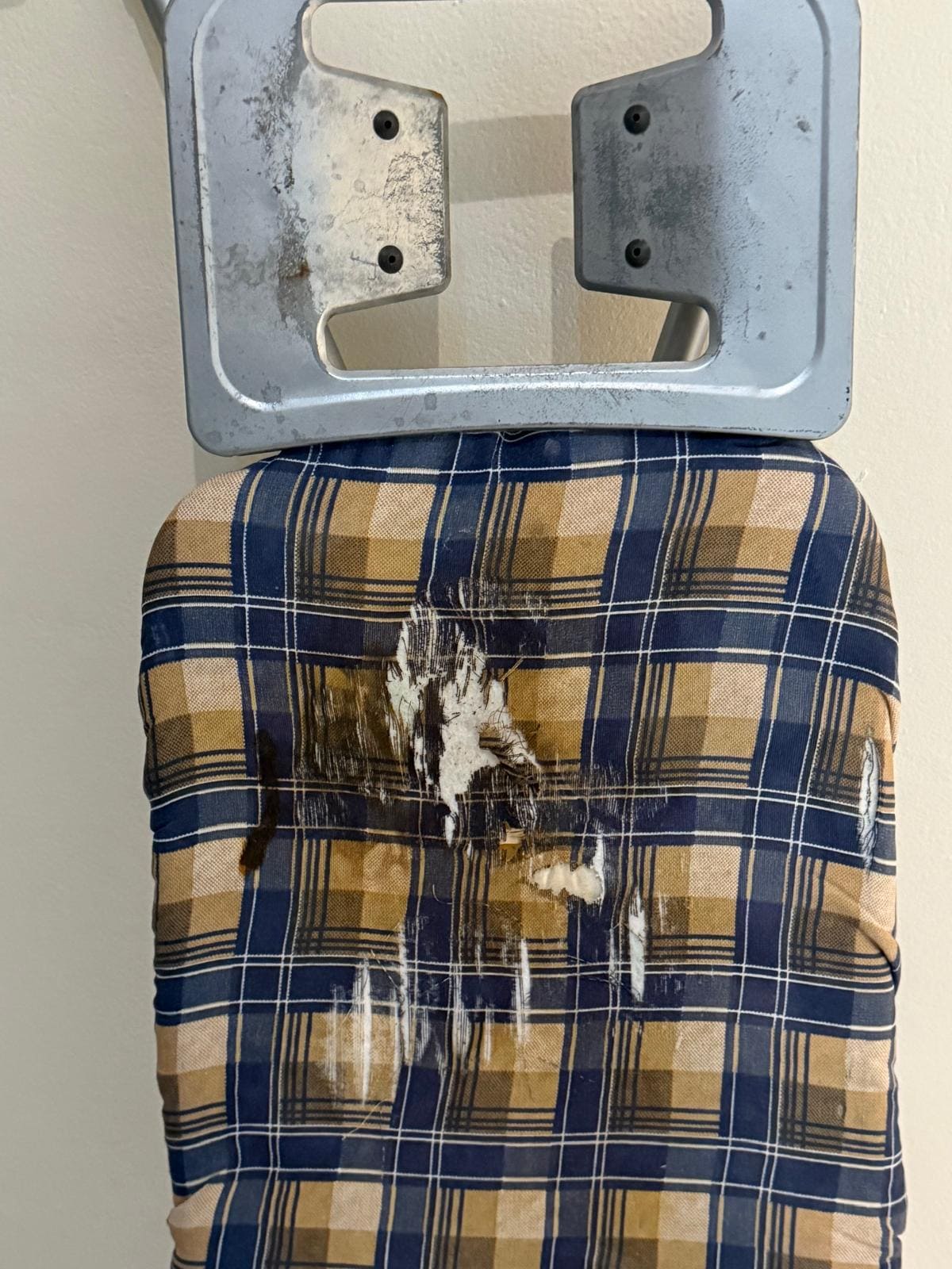 in fairness, this ironing board cover was replaced for us
