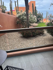 Clearly ground level. I think of an ocean view with a balcony higher than this