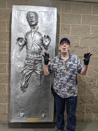 Han and Wayne celebrating a 70th birthday