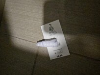 Previous people's garbage including a rolled up used panty liner