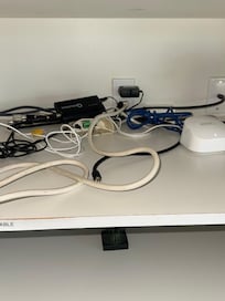 wiring on just left on built in shelf next to tv.