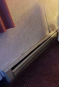Baseboard and wall area