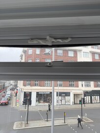 A paper towel plugged the draft from the window