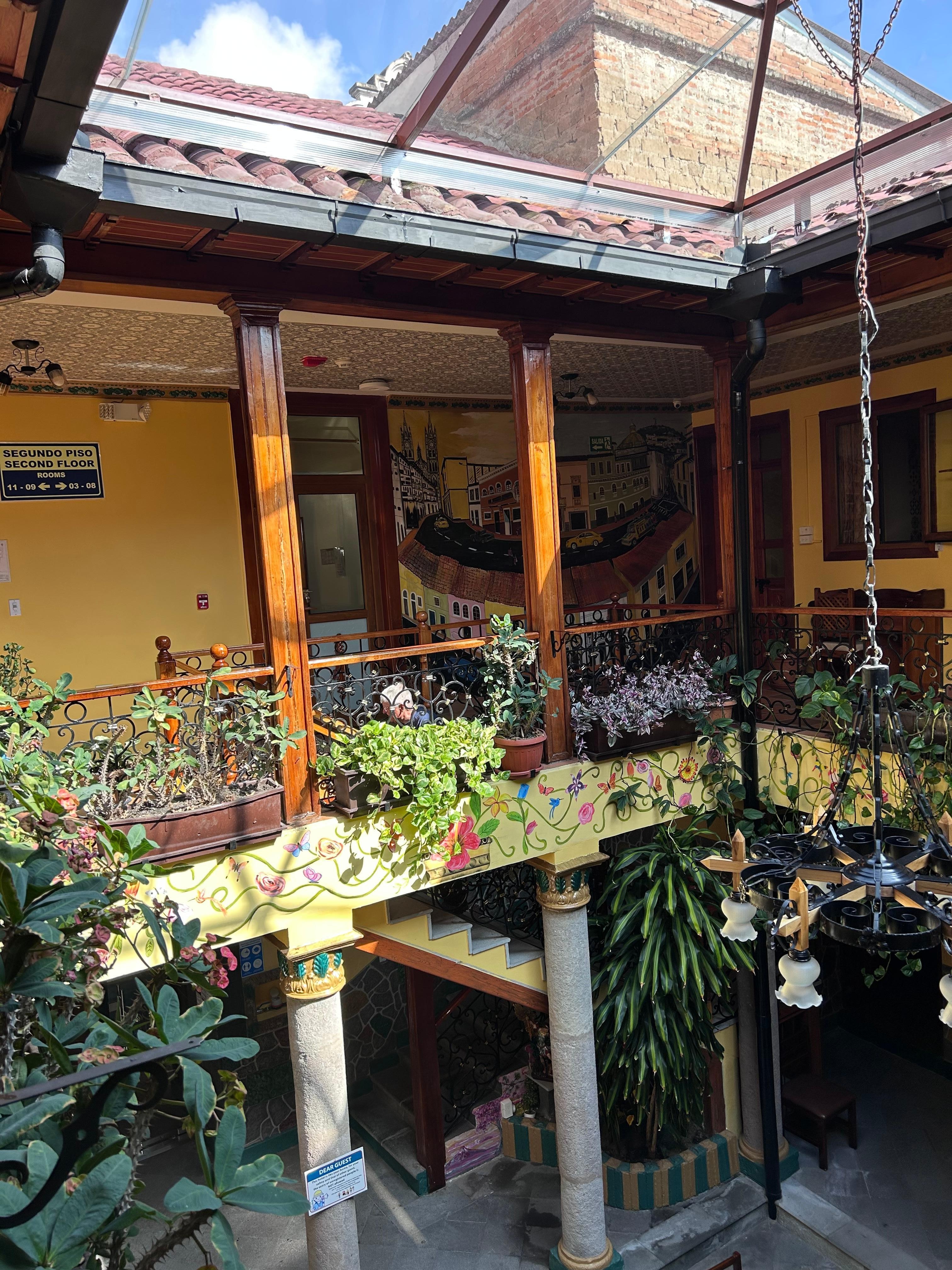 Inside hotel older building but very modernized rooms.open area, lots of greenery