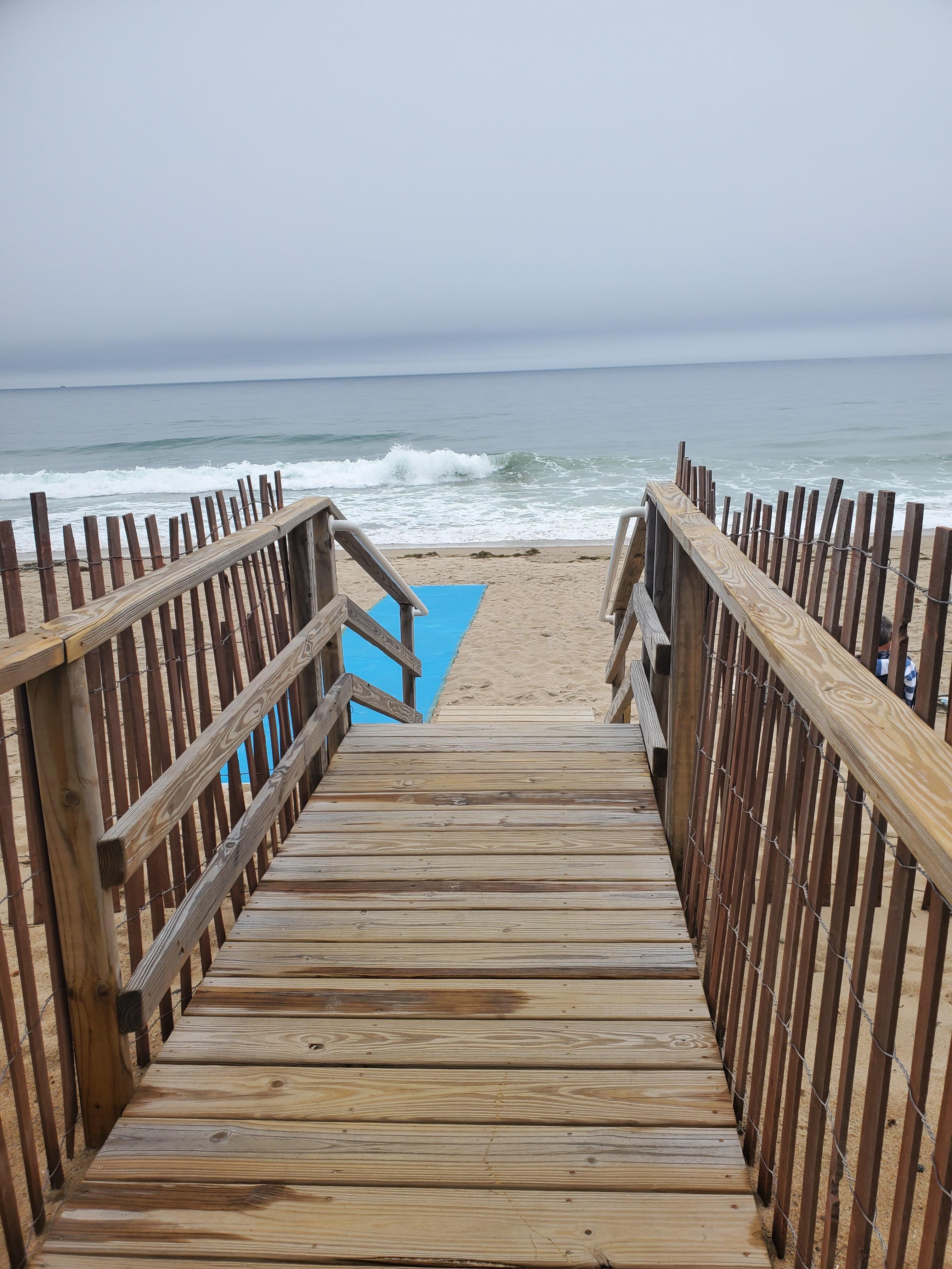 Top of the steps, leading to the beach.