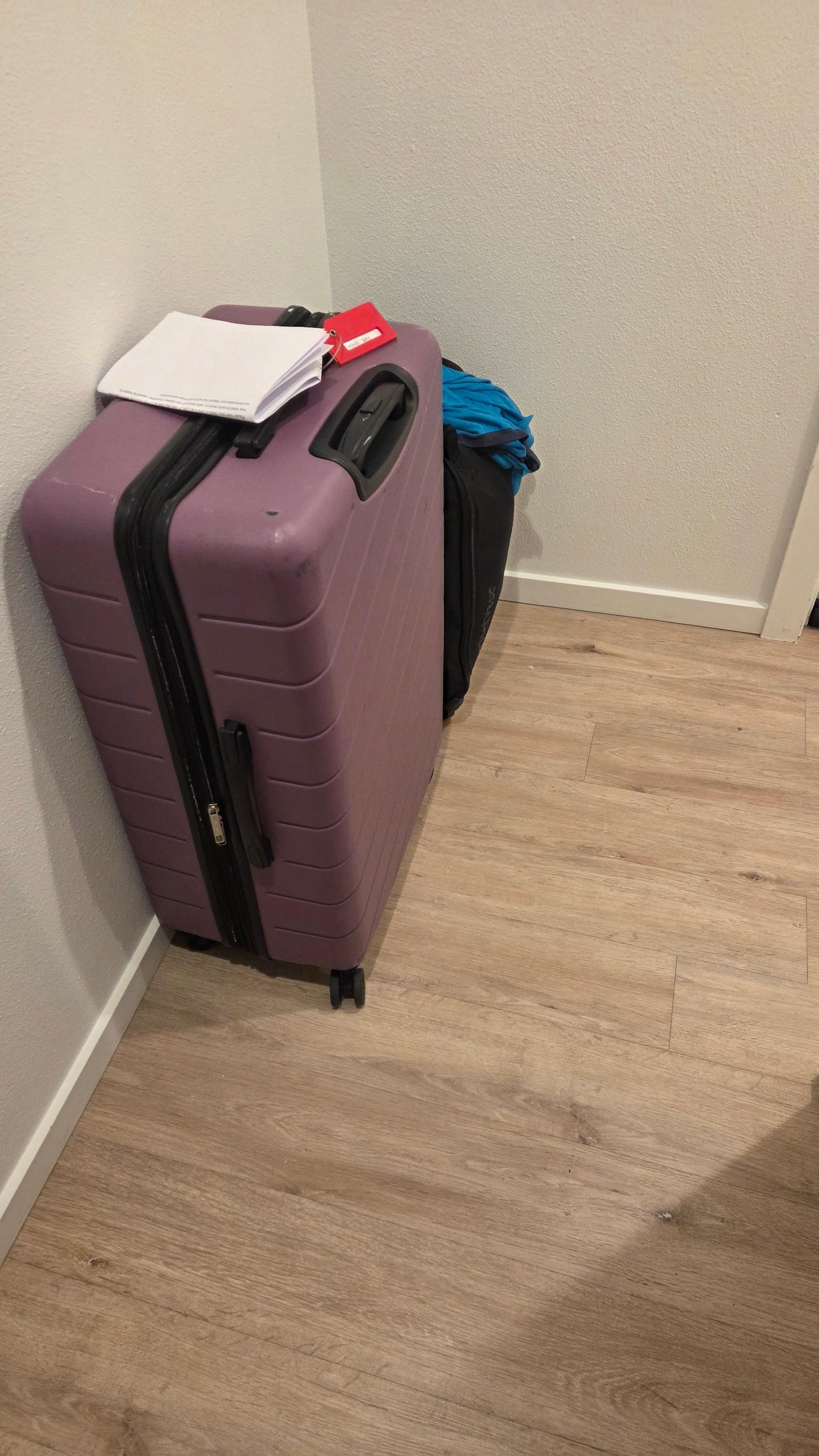 There was also a large black garbage bag that my wife had already taken downstairs that contained anything that was not in our zippered suitcase: clothes; meds, items left in bath.