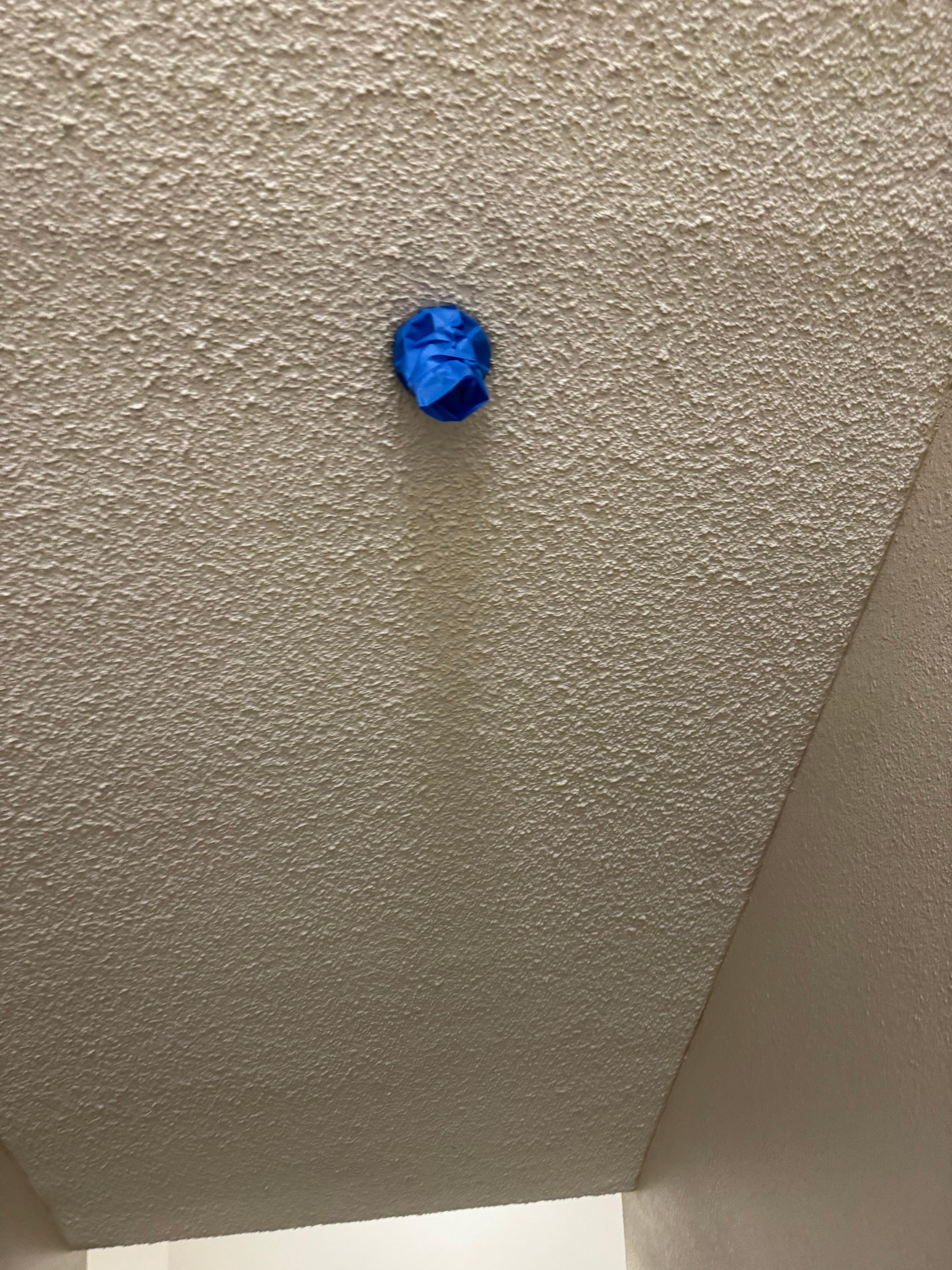 Taped over sprinkler in stairwell 
