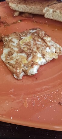 My over medium egg for breakfast. $42.00 for 2 breakfasts without tip and this is what I got.