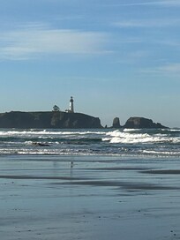 Newport lighthouse on a sunny day.
