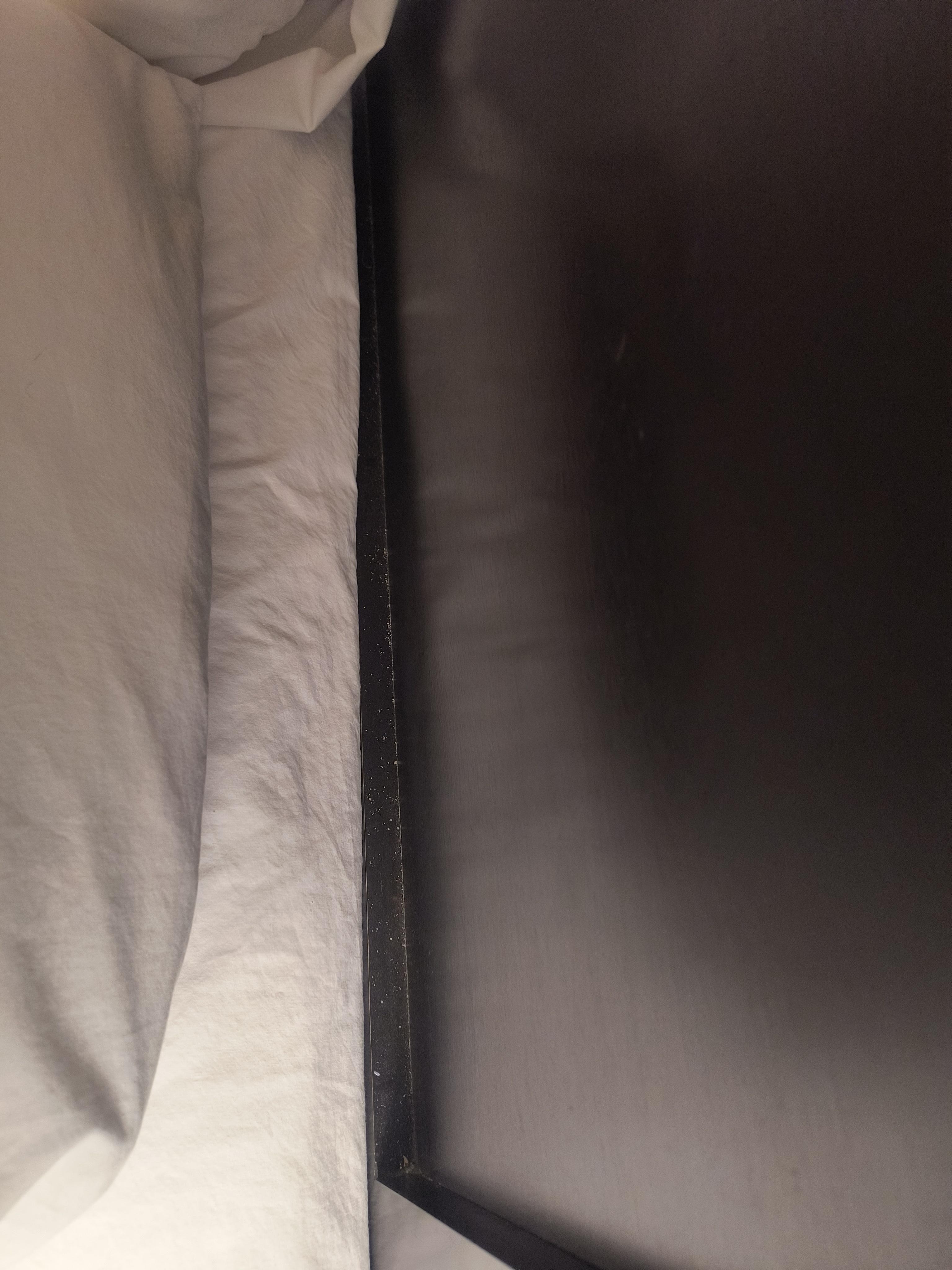 the headboard lower ledge behind our pillows was just dirty.