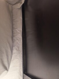 the headboard lower ledge behind our pillows was just dirty.