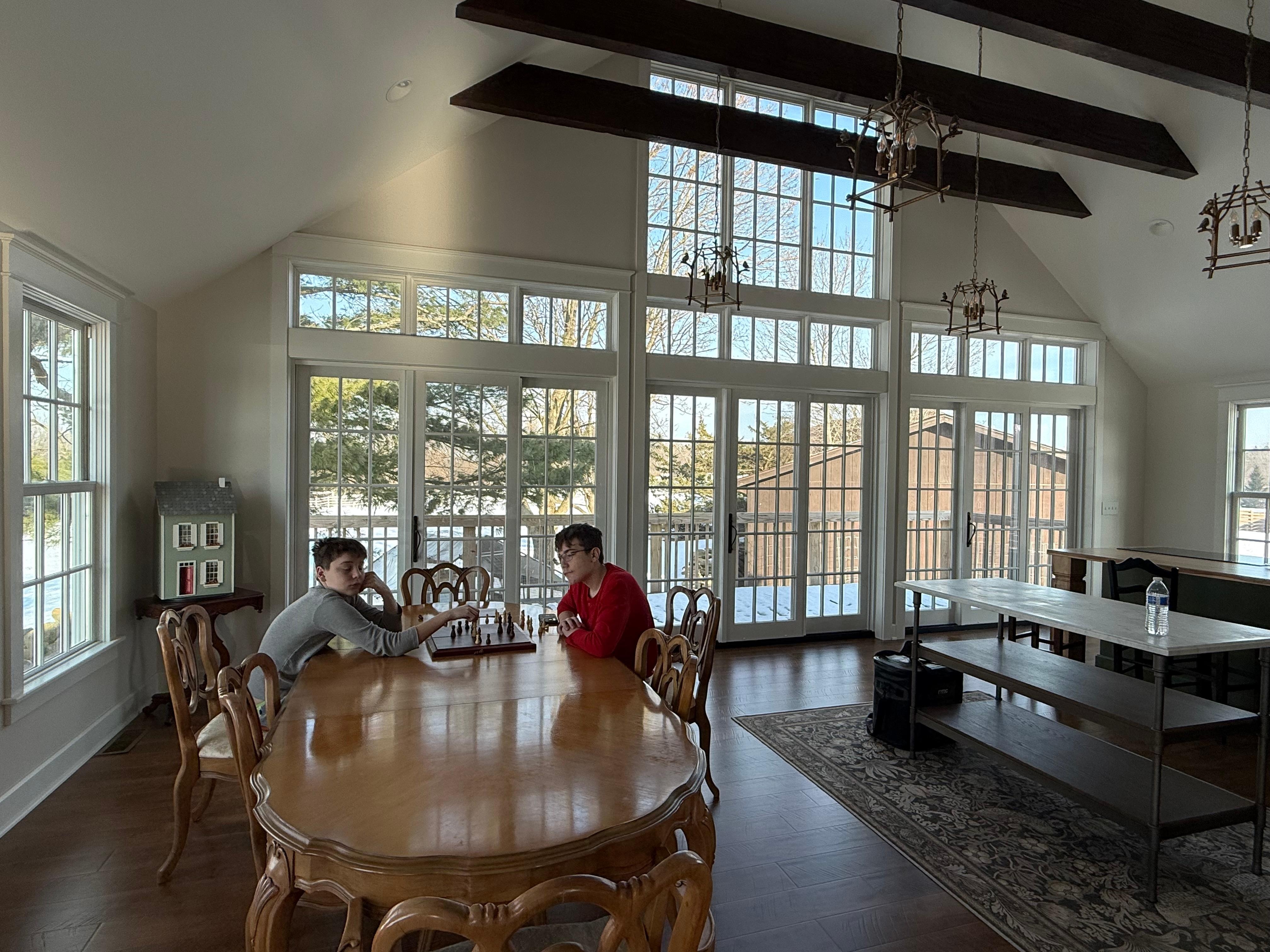 Our boys enjoying a game of chess in the kitchen. 