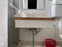 Vanity edging missing and damaged.