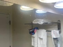 Hard to see, but the mirror has patchy dark spots