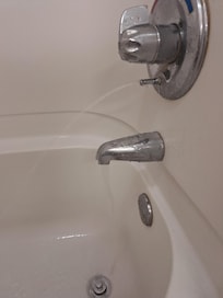 The shower,spout and tub all going at once