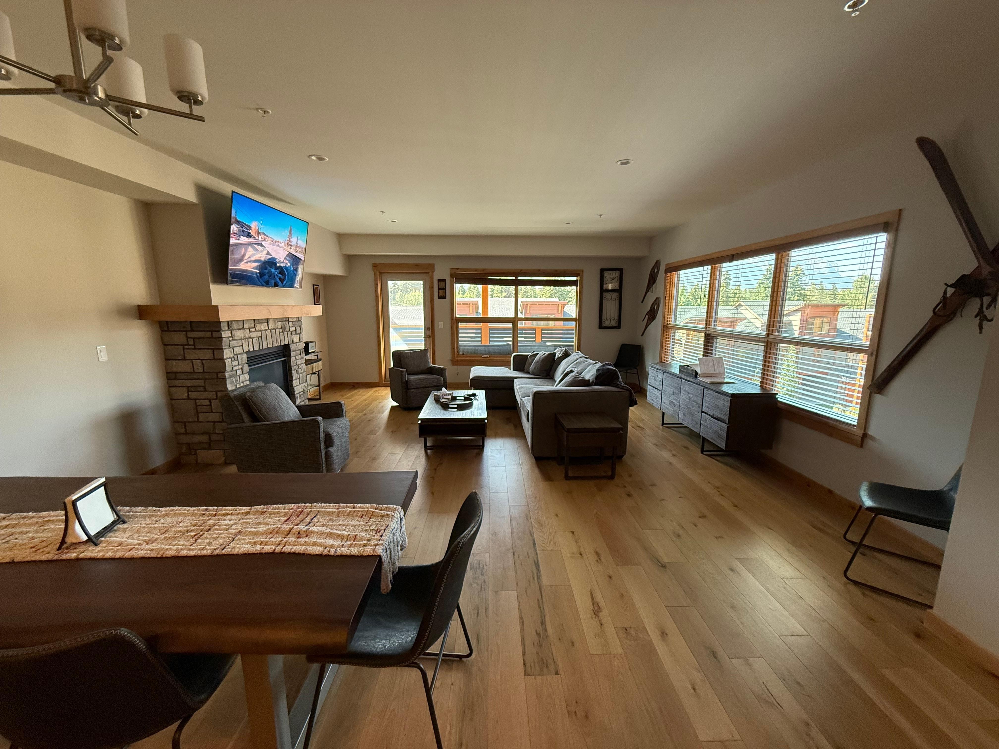 Very spacious living and dining area with lots of windows and mountain views in every direction.