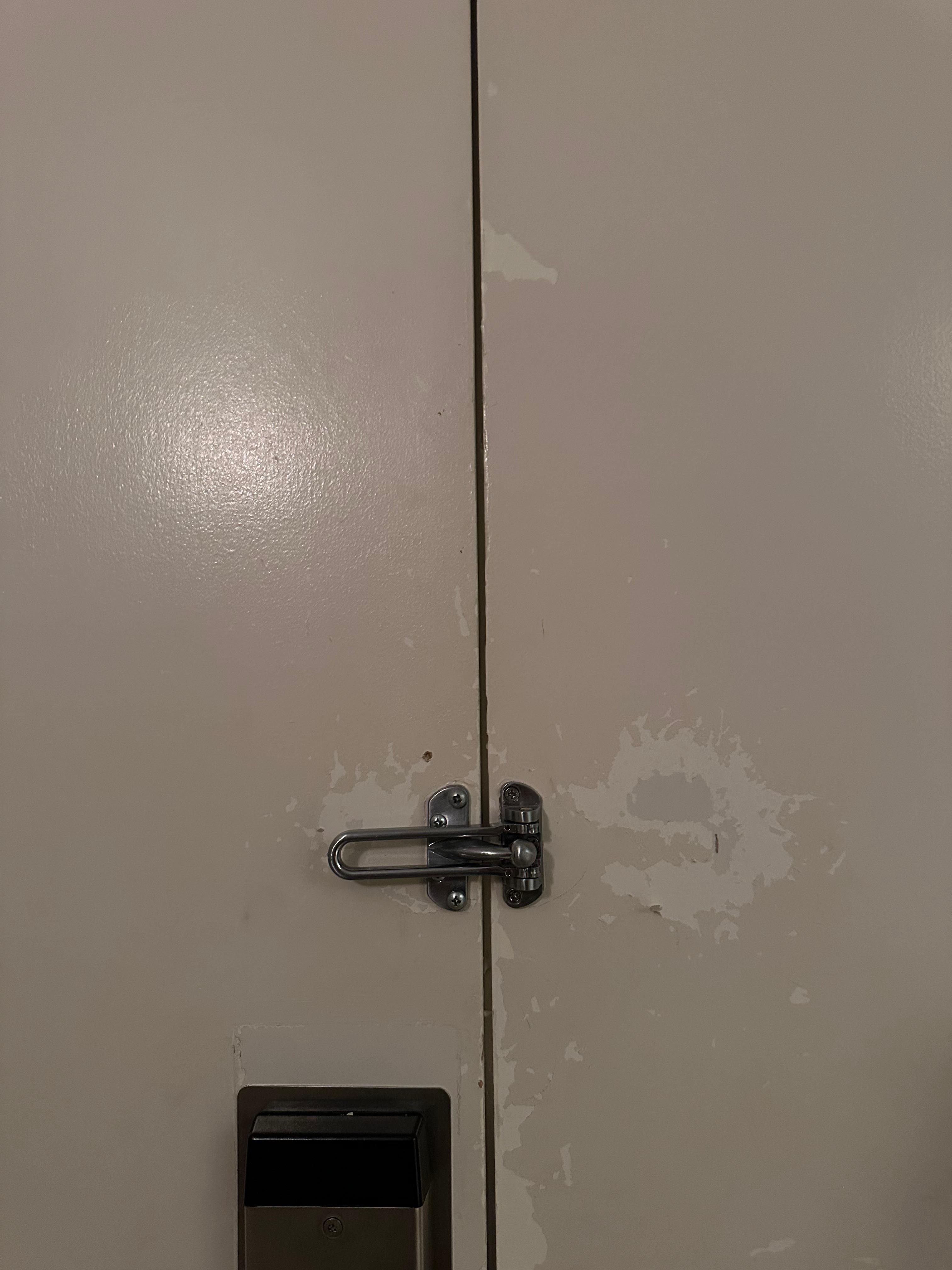 Paint coming off door to room 