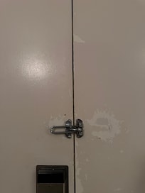 Paint coming off door to room