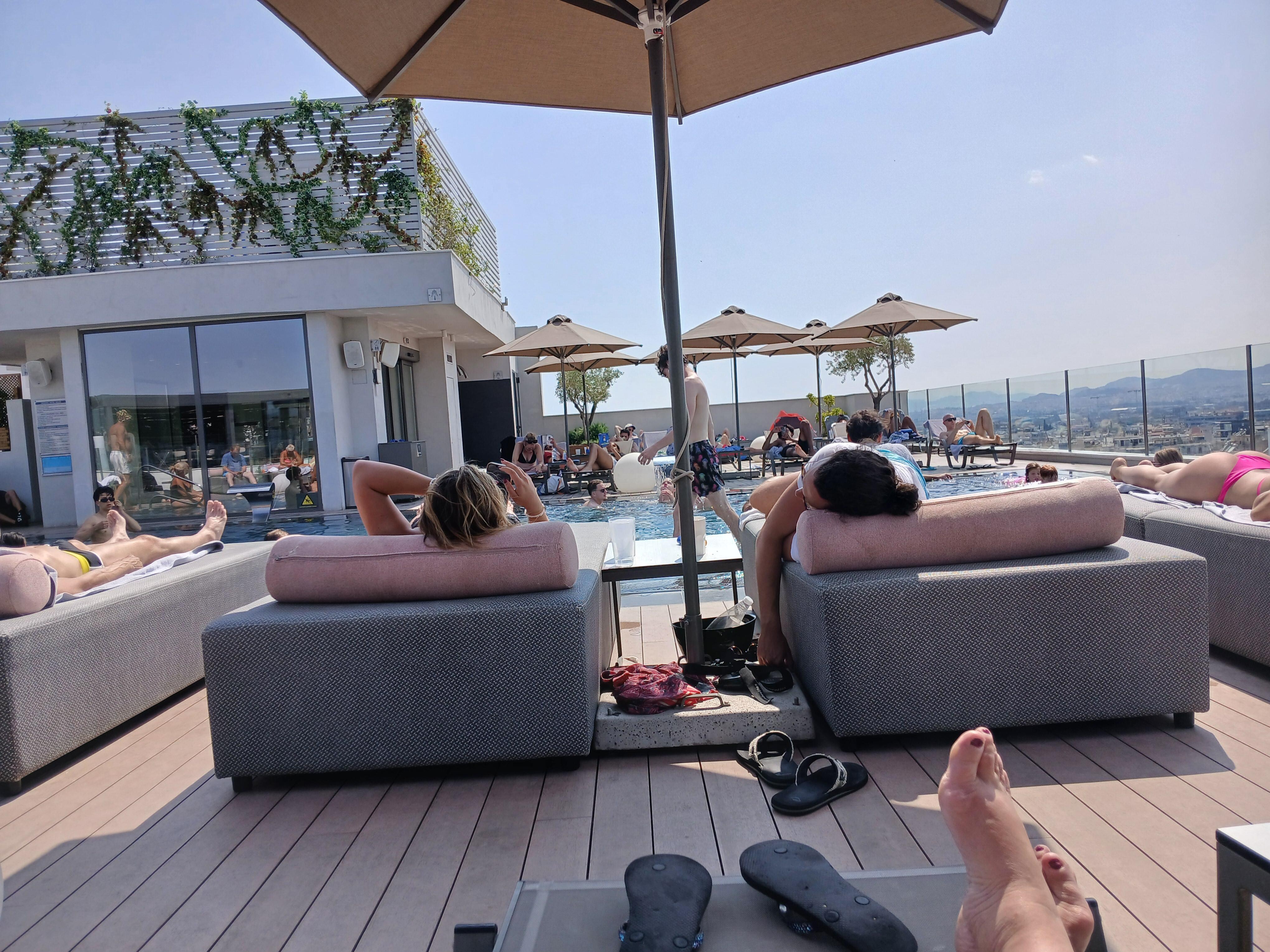Relaxing by the pool, great service including food and drinks