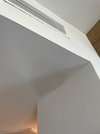 Damp stain due to aircon leak