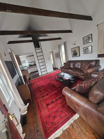 Living room/Front door view (entrance is in back of home).