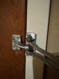 Shows holes from being torn off and relocates. Would not secure.