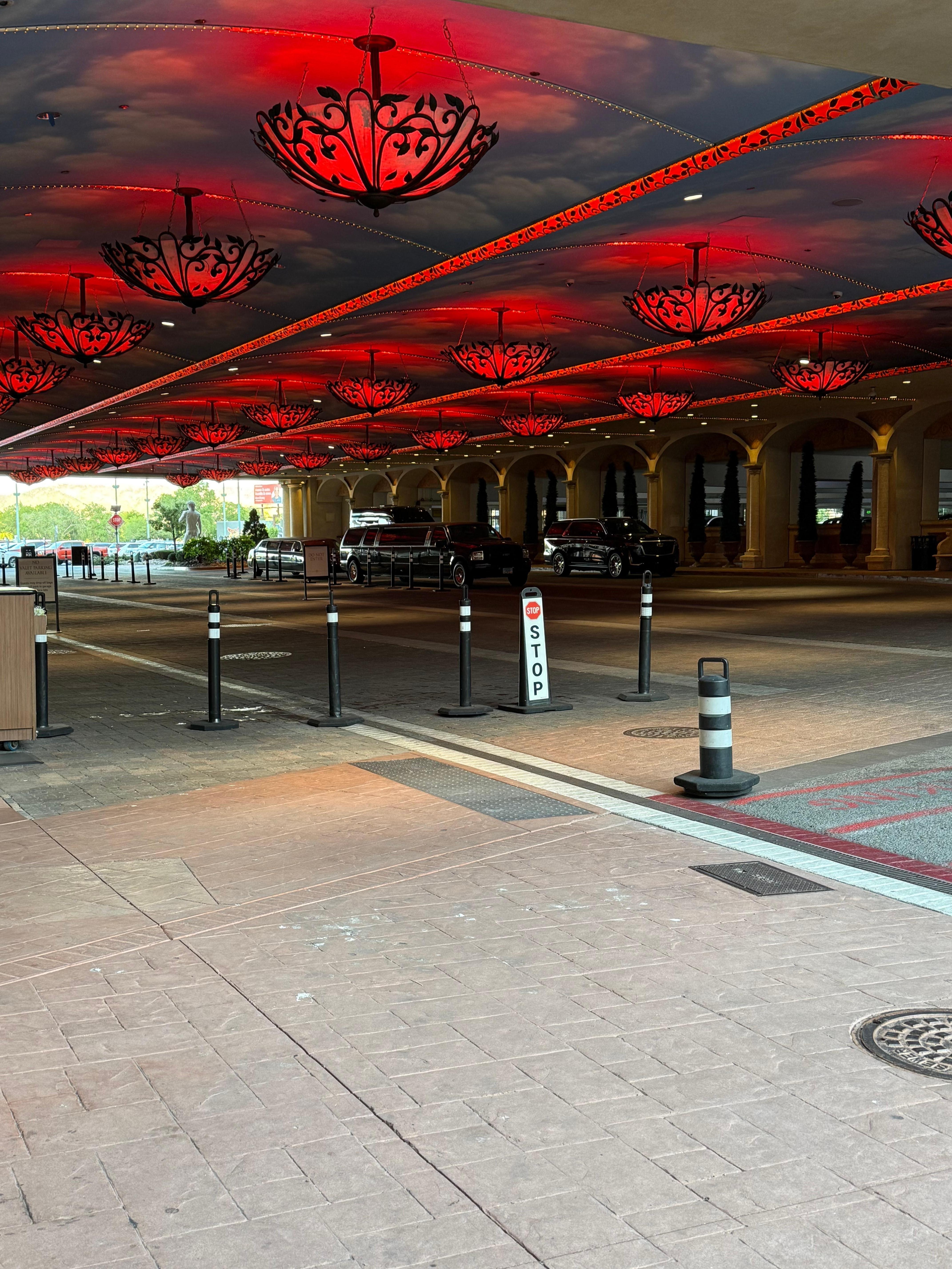 Covered drop off area…cool red lighting 