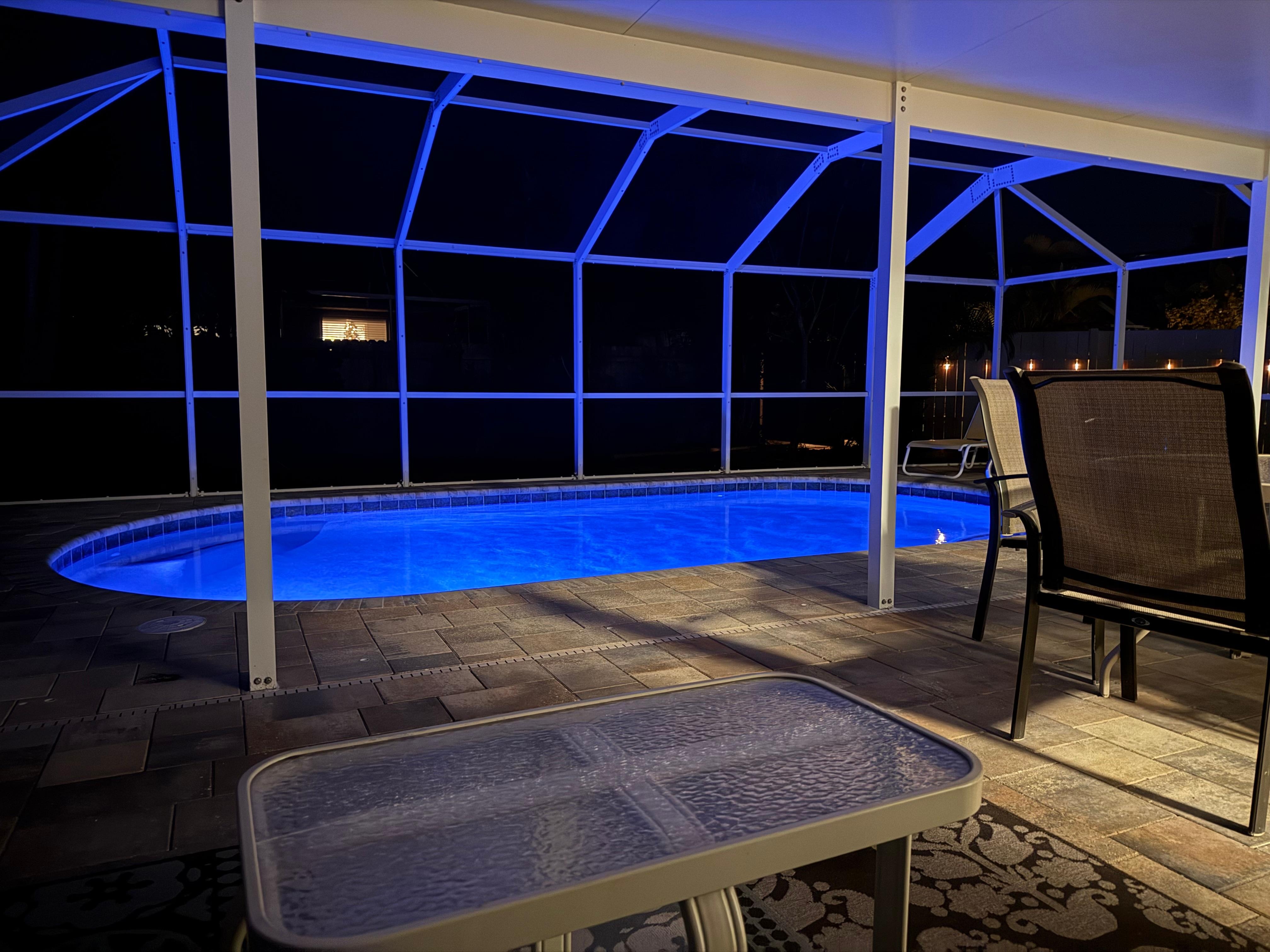 Large covered area for relaxing or dining next to the pool and open roof lanai. 