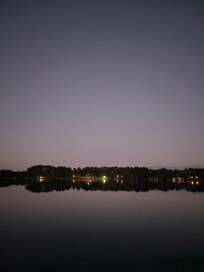 Sitting on the pier looking across the lake.