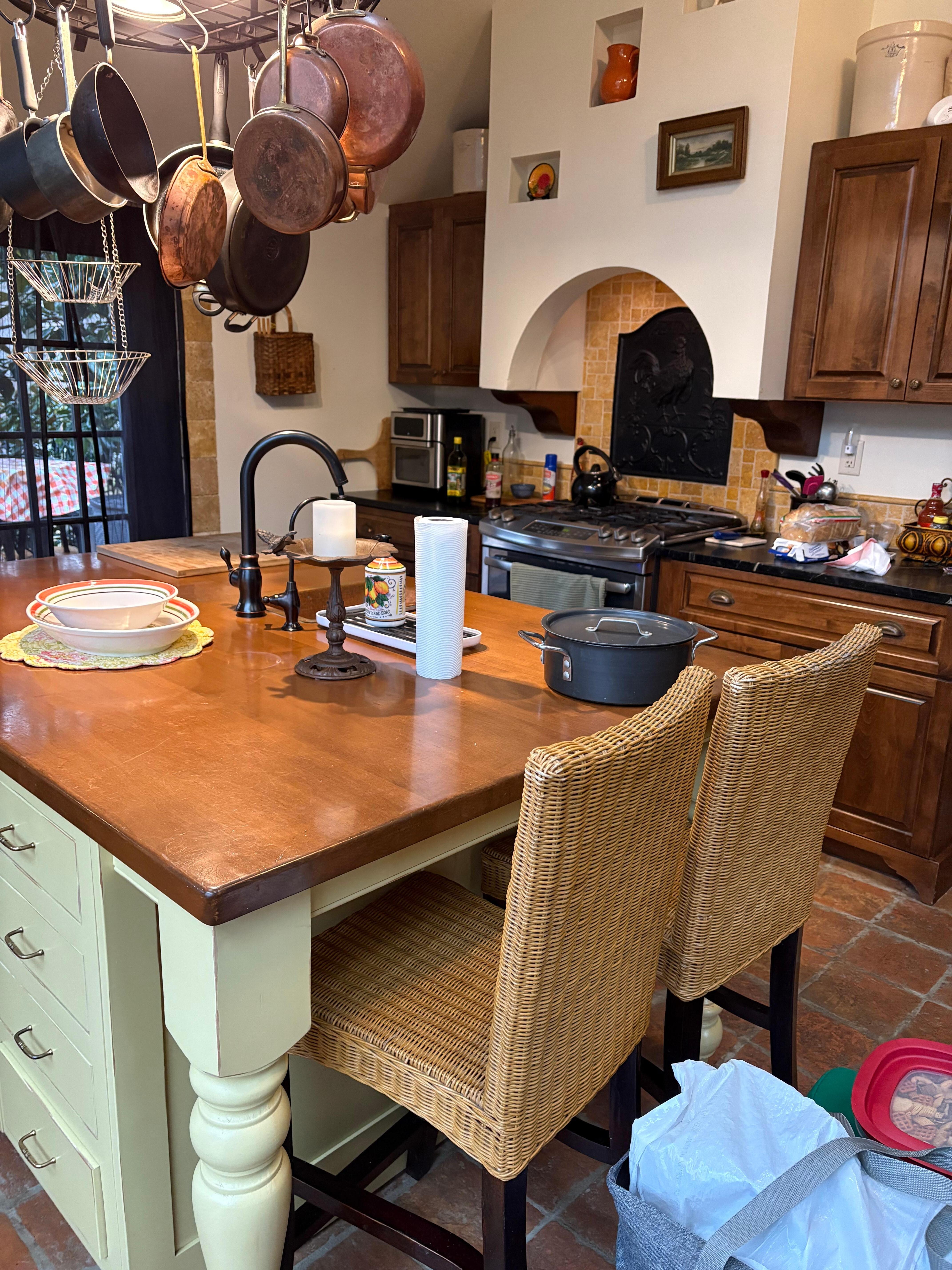 One corner of kitchen with large island.