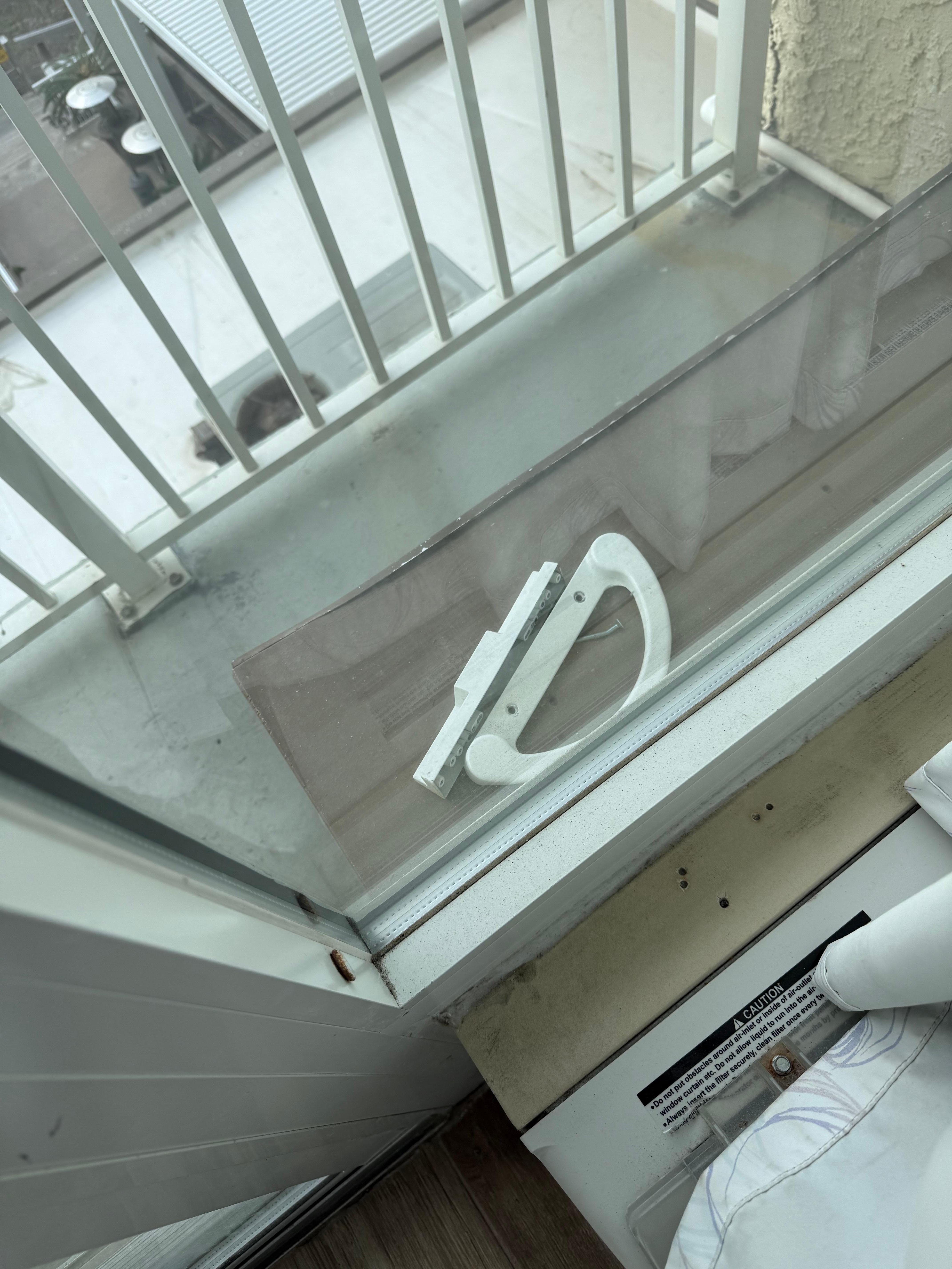 This is the handle to the glass door to our balcony, sitting outside on the balcony