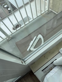 This is the handle to the glass door to our balcony, sitting outside on the balcony