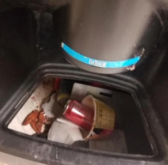 ice machine filled with trash