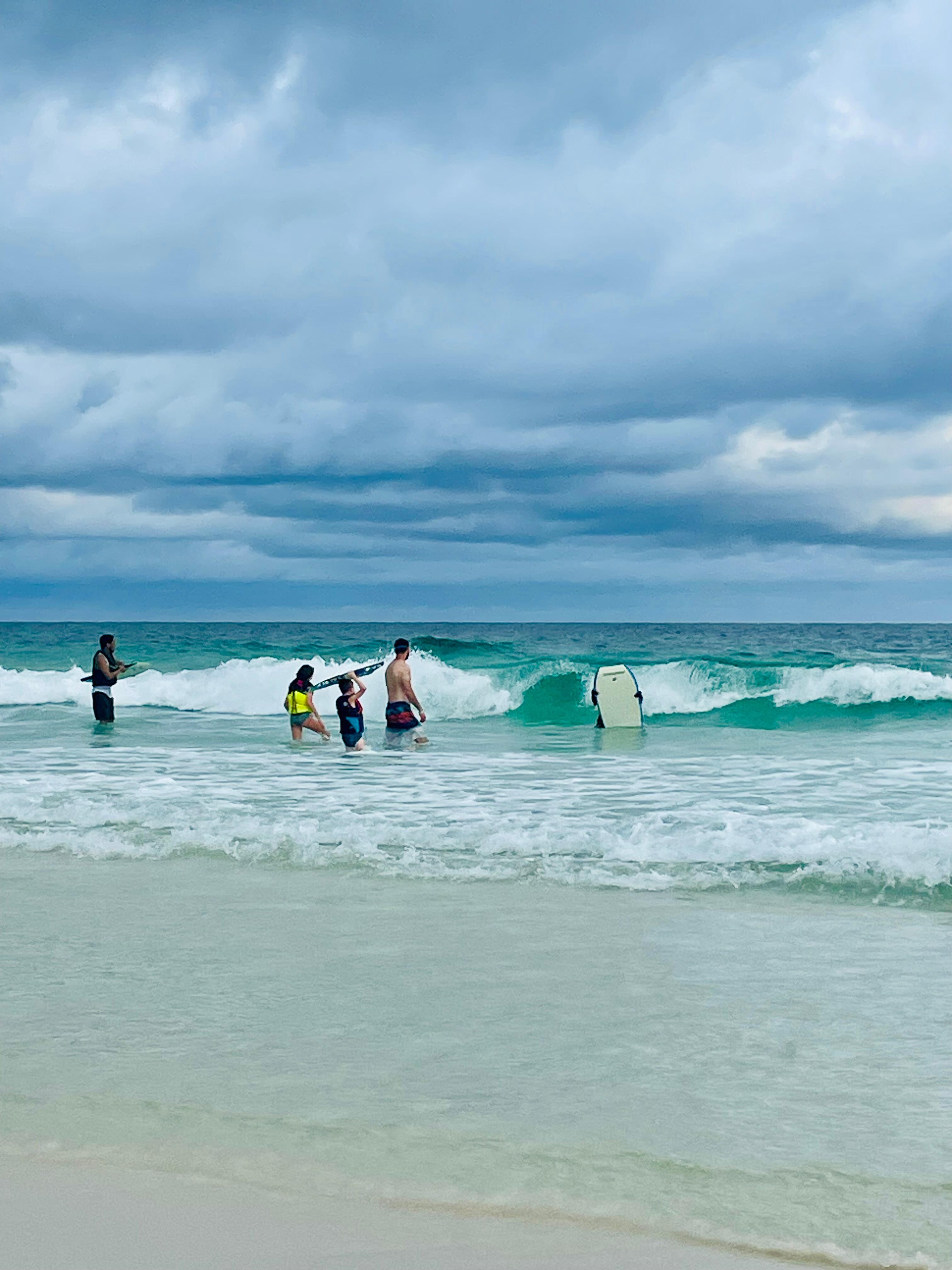 Fun on the beach, catching sun, sand, and waves. 